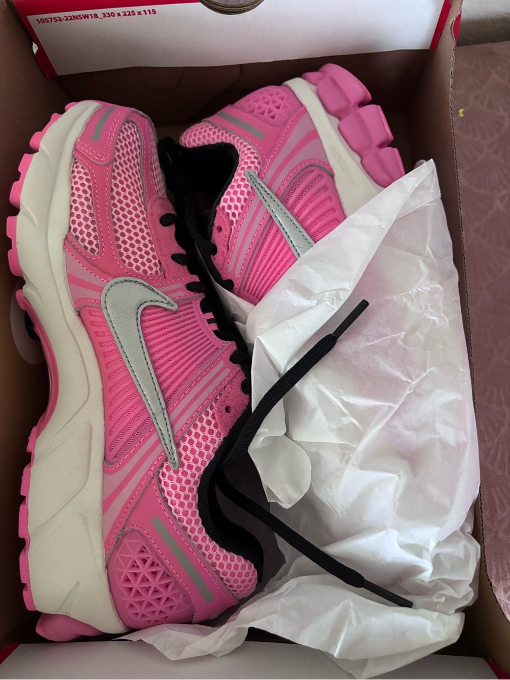 Nike Women’s Pink Athletic Running Shoes with Silver Swoosh
